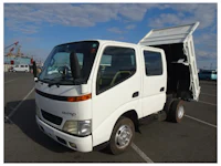 a white truck with a sold sign on it