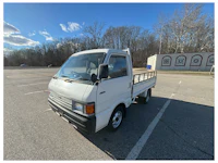 a white truck with a sold sign on it
