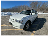 a white truck with a sold sign on it