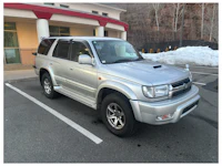 a white truck with a sold sign on it